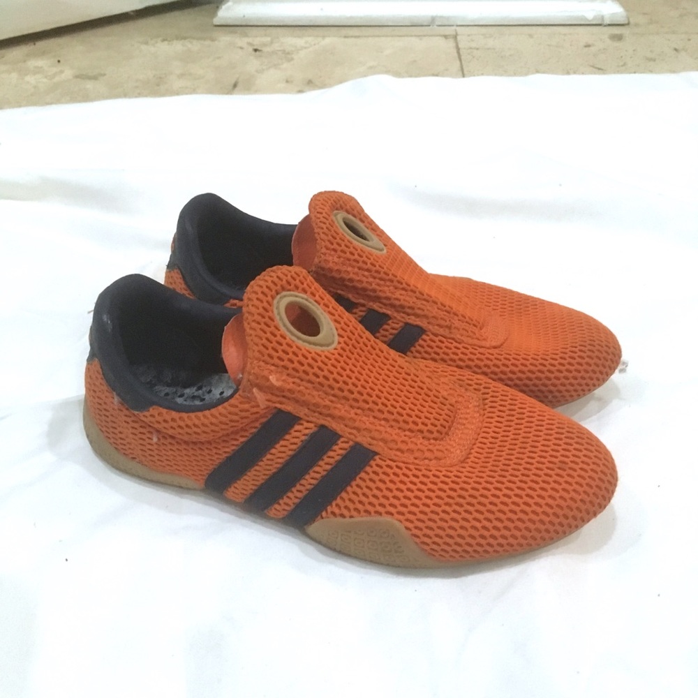 Orange adidas sneakers